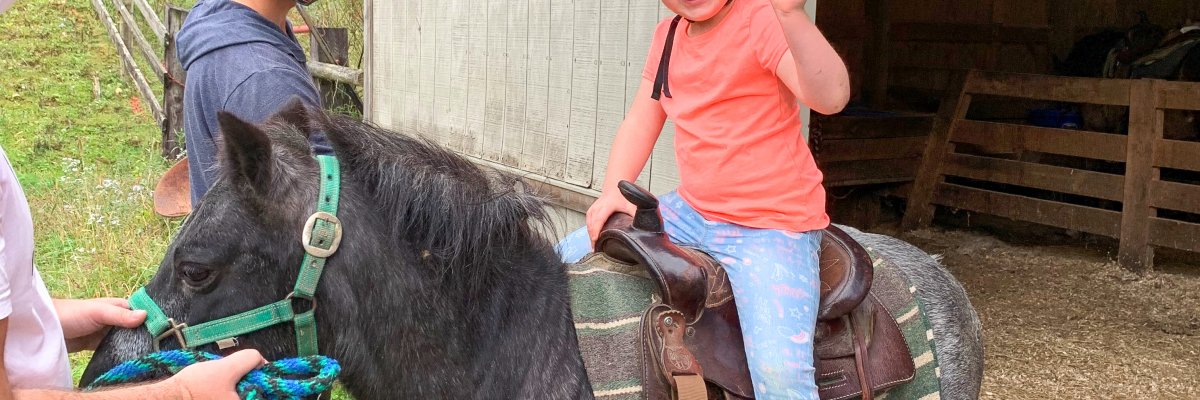 Bea riding a horse