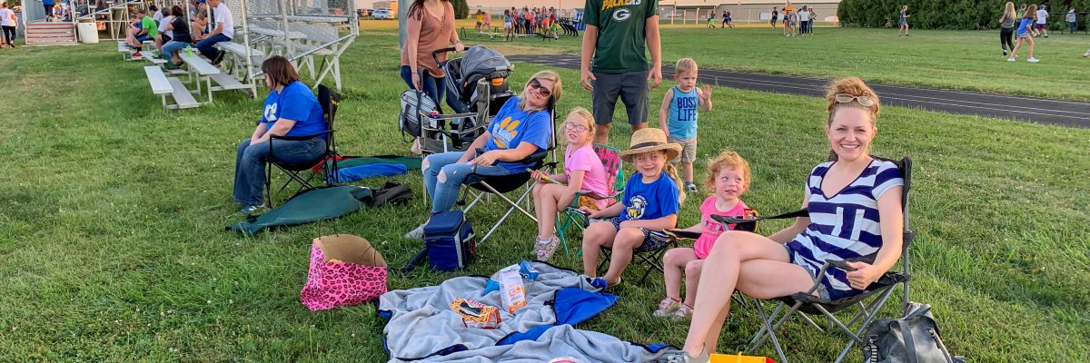 The Wilke and Fohey family gathering to watch MFL MarMac football on Friday night