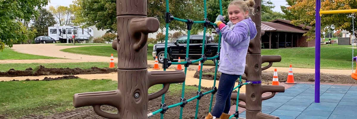 Bea playing at the playground